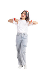 An Indonesian girl celebrates Indonesian independence day on 17 August while pointing to something