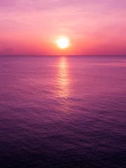 Fotobehang Early morning, pink sunrise over sea © Jitti