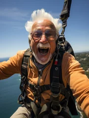 Tuinposter senior person enjoying adventure sports © kalafoto