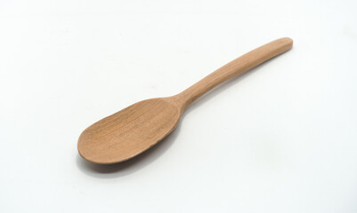 wooden spoon on white background