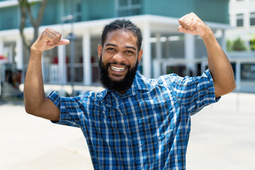 Cheering african american man with beard