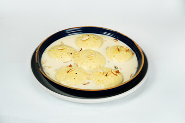 Ras malai in a bowl on isolated white background             
