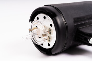 Studio light flash lamp closeup on white background isolated