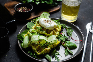Zucchini waffles with poached egg