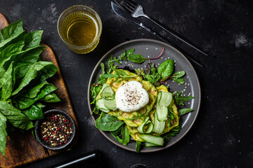 Zucchini waffles with poached egg