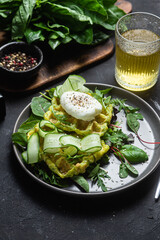 Zucchini waffles with poached egg