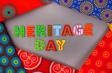 Heritage Day South Africa, 24th September. Heritage Day written in colorful letters with iconic South African printed cloth