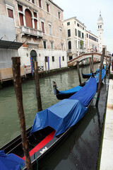 Fototapeta na wymiar Street, canal and traditional venitian appartment building - Venice - Italy