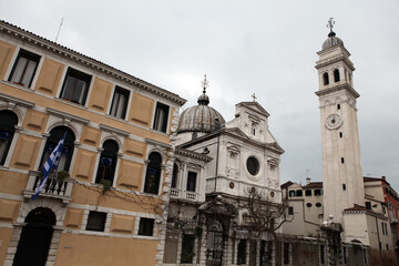 Fototapeta premium Tower bell, alignment of appartments, canal and boat - Venice - Italy