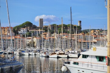 Fototapeta na wymiar awesome panorama view on and old city boats in the harbor Cannes, Cote Dazur