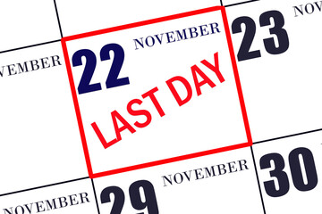Text LAST DAY on calendar date November 22. A reminder of the final day. Deadline. Business concept.