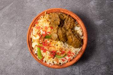 Hari Beef Biriyani or green meat biryani rice served in dish isolated on background top view of bangladesh food