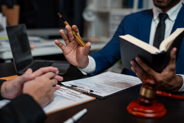 Legal execution department makes an appointment with the customer to sign a mediation agreement to pay the debt. Lawyer discuss the contract document. Treaty of the law. Sign a contract business.