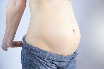 Naklejka premium Motherhood pregnancy makes a woman beautiful and happy