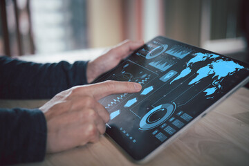 Business man Analytics and Data Management System on computer, make a report with KPI and metrics connected to database. Corporate strategy for finance, operations, sales, marketing.