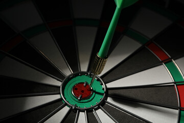 Target, dartboard, hitting the center. Winning goals business concept.