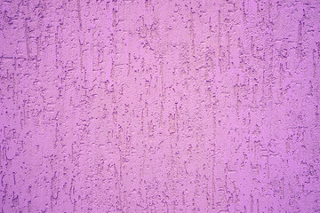 Background of purple stone wall with textured drips.