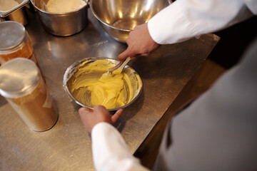 Chef Beating Soft Butter when making cream for cake or spread for sandwiches