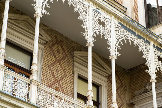 Antique windows and balconies of Villa Hermes in neo-baroque style in Vienna, Austria