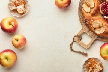 Jewish Holidays - Rosh Hashanah or Rosh Hashana. Pomegranate, apples, honey and round challah on...