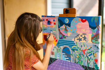 Artist woman with a painting