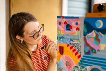 Artist woman with a painting