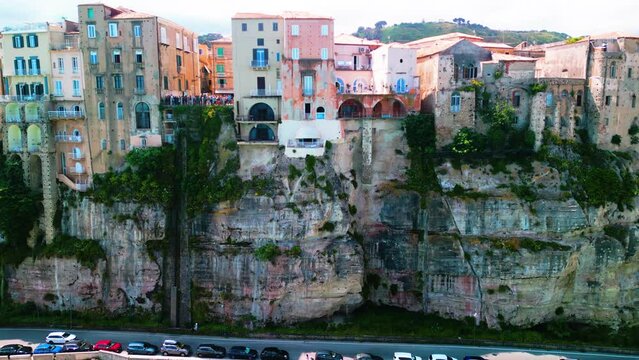 Tropea's Timeless Charm: Aerial View of Colorful Houses and old historic architecture placed on a high cliff in Italy