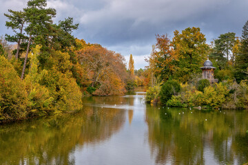 Scenic lake in the Bois de Boulogne, Paris France,  in fall