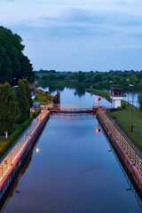 Barrage on the river by evening