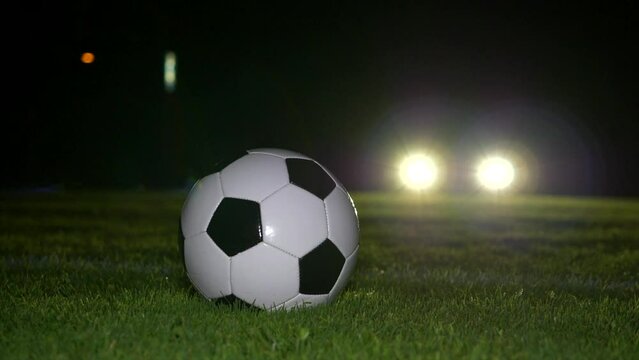 Soccer Player Athlete Training Foot ball Sport on Soccer Field at Night