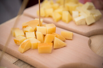 Hard Cheese Festival. Cheese in the market. Homemade cheese. Craft cheese. Milk product. Cheese tasting.