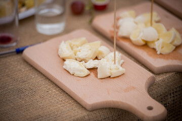 Hard Cheese Festival. Cheese in the market. Homemade cheese. Craft cheese. Milk product. Cheese tasting.