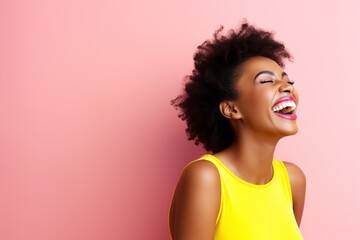 Joyful Laughter of African Woman On a Pink Backdrop