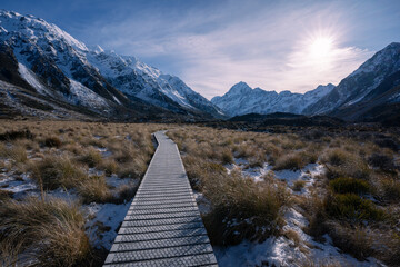 Hiking in New Zealand within mountain landscape