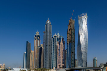 Fototapeta na wymiar sky high buildings in marina Dubai , Dubai Marina is an affluent residential neighborhood known for The Beach at JBR