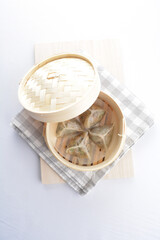 steamed handmade crystal vegetable prawn shrimp dumpling har gao in bamboo basket on white background vegan appetiser dim sum snack Halal food restaurant cuisine menu for cafe