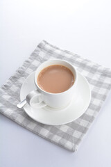 hot cocoa chocolate, milk tea, milk coffee kopi mocha latte cappuccino in white cup on grey cloth white background asian beverage halal food drink menu for hotel bar