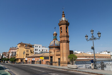 Sevilla, Spain. The Capilla del Carmen (Carmel Chapel) also known as Iglesia del Puente (Bridge Church), by Anibal Gonzalez - obrazy, fototapety, plakaty