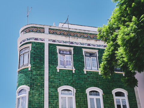 A facade of green tiles, Portugal.