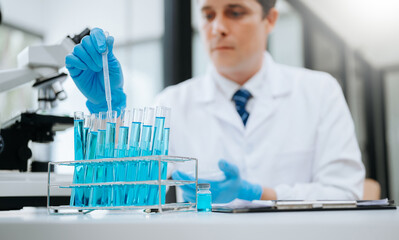 Modern medical research laboratory. female scientist working with micro pipettes analyzing biochemical samples, advanced science chemical laboratory .