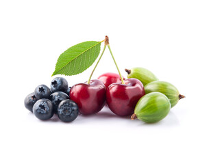 Sweet berries of blueberries,cherry and goosberry on white backgrounds.