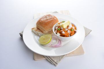 indian vegetable bean curry with baked bread bun burger toast onion lime breakfast on white background asian chef appetiser halal bakery food restaurant pastry menu for cafe