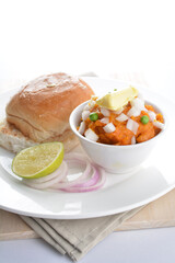 indian vegetable bean curry with baked bread bun burger toast onion lime breakfast on white background asian chef appetiser halal bakery food restaurant pastry menu for cafe