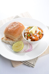 indian vegetable bean curry with baked bread bun burger toast onion lime breakfast on white background asian chef appetiser halal bakery food restaurant pastry menu for cafe