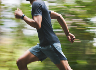 Man, motion blur and running in park for exercise, fitness action and power of cardio workout....
