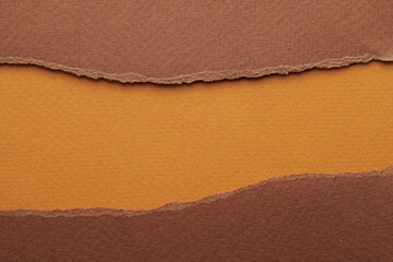 Art collage of pieces of ripped paper with torn edges. Sticky notes collection brown colors, shreds of notebook pages. Abstract background.