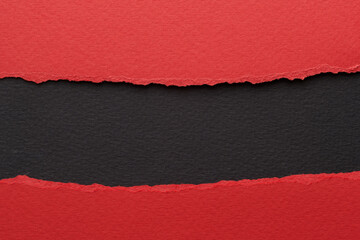 Art collage of pieces of ripped paper with torn edges. Sticky notes collection red black colors, shreds of notebook pages. Abstract background.