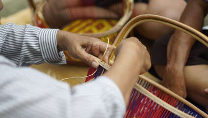Wicker basket weaving, handmade People are making baskets, hand made,handmade baskets for things and materials.	