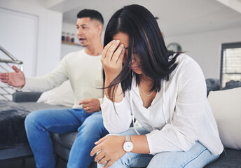 Frustrated couple, headache and fight in divorce, conflict or disagreement on living room sofa at home. Unhappy man and woman in breakup, cheating affair or dispute from toxic relationship in house - obrazy, fototapety, plakaty