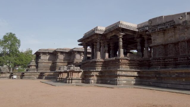 Belur, Karnataka, India-June 17 2023; A Pan view of the Magnificent stone temple exterior built by the Vijayanagar rulers and dedicated to God Shiva in Halebeedu in Karnataka, India.
